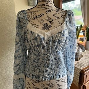 American Eagle long sleeve top blue and with size medium.